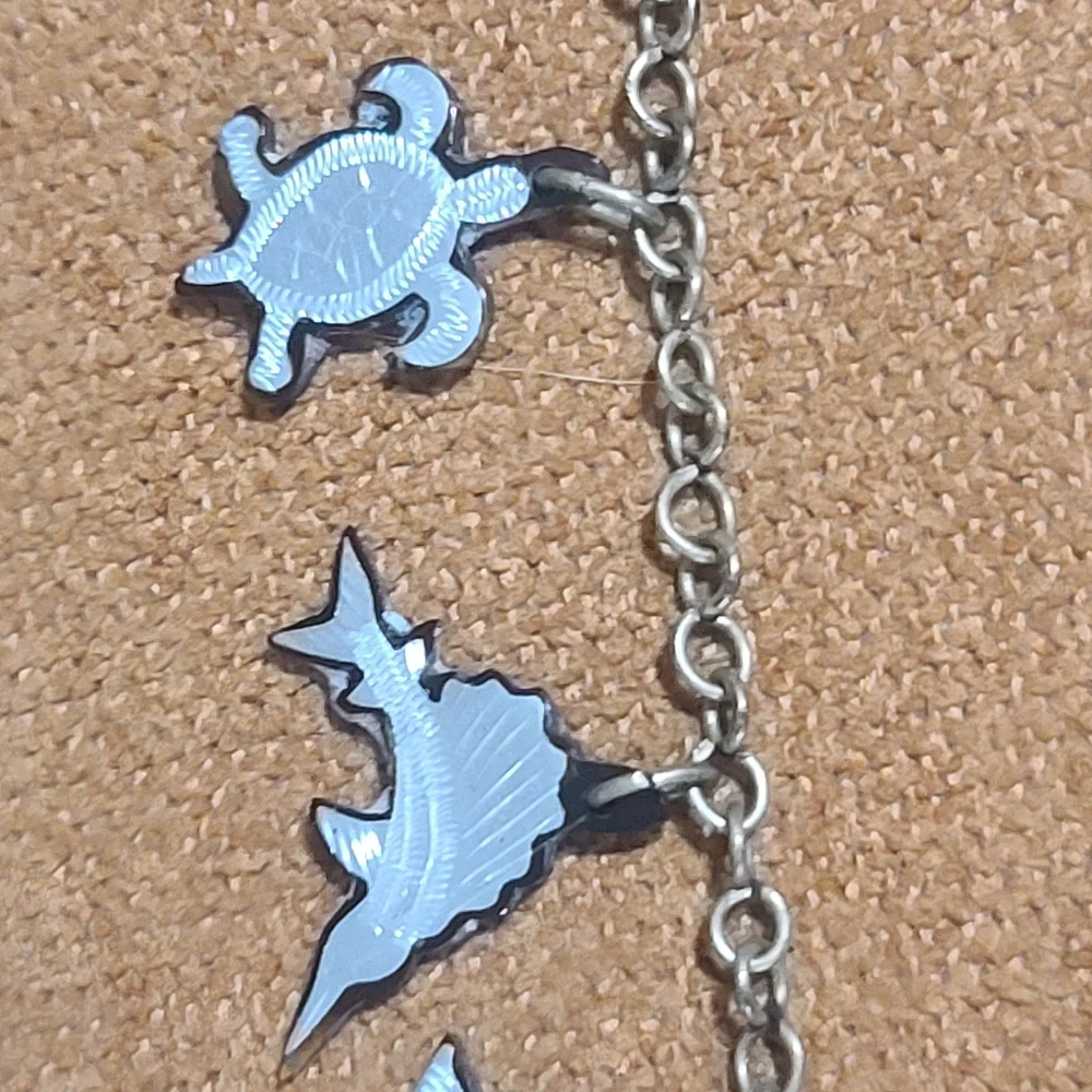 Silver Tone Charm Bracelet with Tropical Motifs, 7 Inches